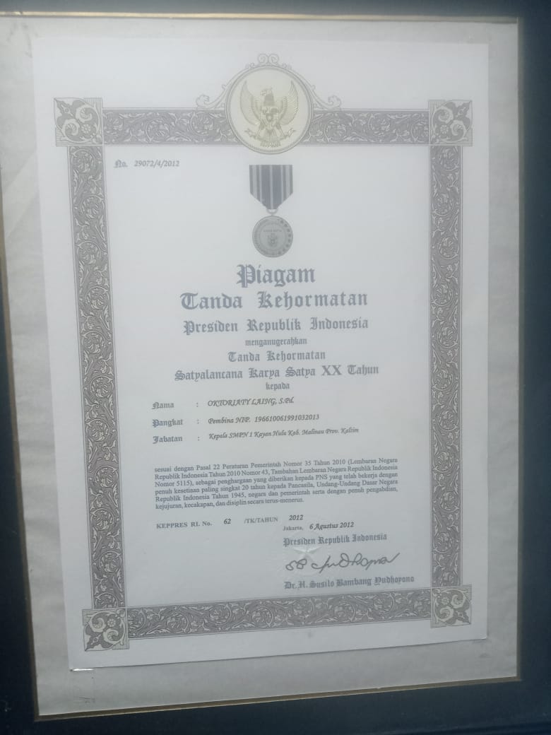 OKTORIATY LAING, S.Pd